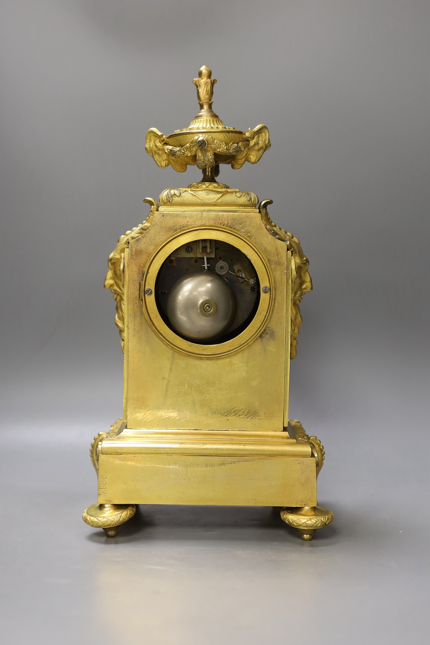 A 19th century French ormolu and alabaster mounted mantel clock with key and pendulum - 38cm high